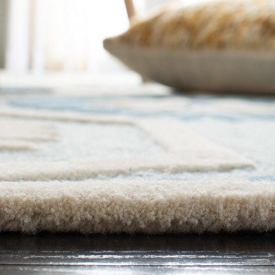 Hand-Tufted Elegance Blue & Ivory Wool Area Rug, 4' x 6'