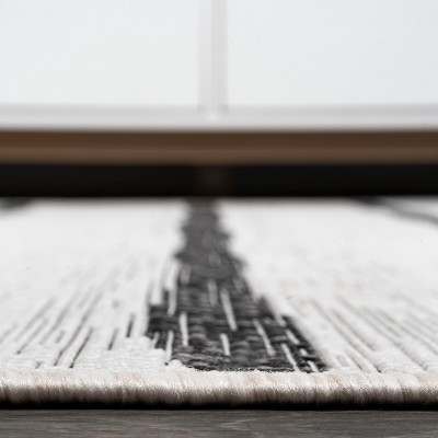 Ivory and Black Striped Synthetic 4' x 6' Indoor/Outdoor Rug