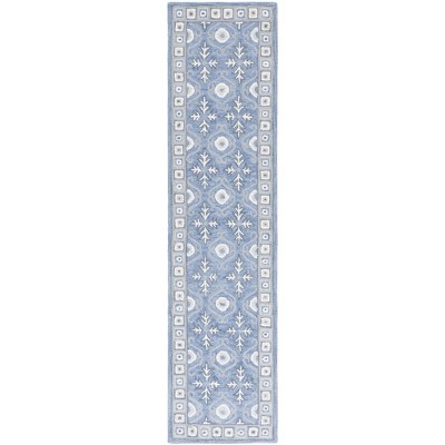 Ebony EBN651 Handmade Tufted Rug - Safavieh