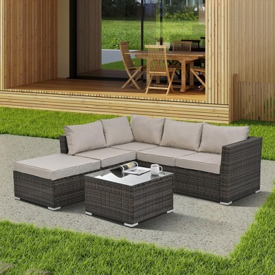 NicBex 4 Piece Outdoor PE Wicker Furniture Set with 2 Sofa,1 Ottoman and Tempered Glass Top Coffee Table for Garden,Patio