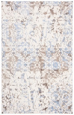Ivory and Blue Tufted Handmade Wool and Viscose 6' x 9' Area Rug