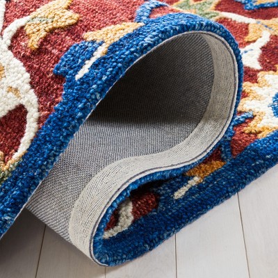 Handmade Floral Elegance Blue Wool Rug - 4' x 6' Tufted Design