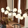 Rennnsan Felnix 35" W 16 -Light Milk Glass Dimmable Contemporary Linear Kitchen Island Pendant in Brass & Black - 3 of 4