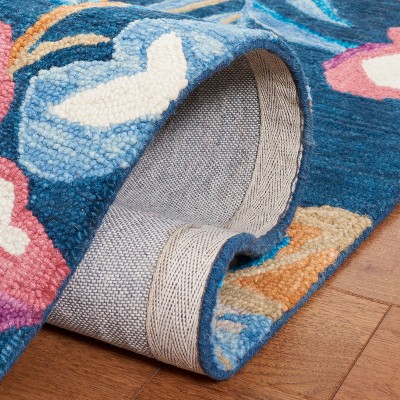 Handmade Blue Floral Wool Area Rug, 4' x 6'
