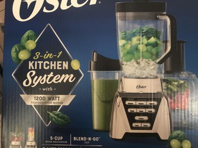 Oster Blender and Food Processor Combo with 3 Settings for Smoothies,  Shakes, and Food Chopping, Includes 2 24-Ounce Cups and Lids, Carbon Grey
