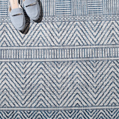 Ivory and Navy Geometric Reversible Synthetic Square Rug