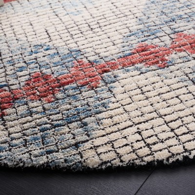 Ivory and Blue Abstract Hand Tufted Round Wool Rug