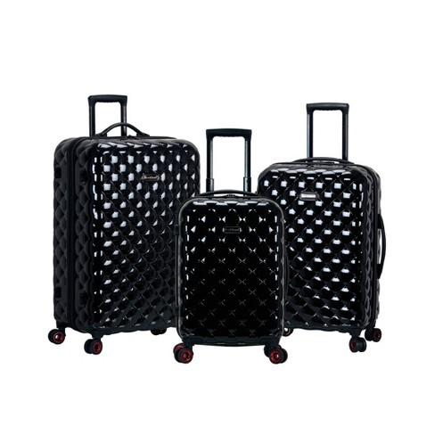 Black store quilted luggage