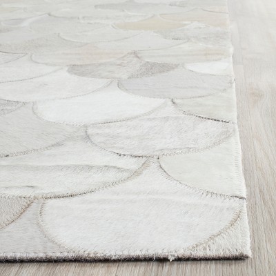 Ivory Geometric Handmade Cowhide Area Rug