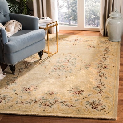Hand-Tufted Elegance Round Blue Wool Area Rug, 5' x 8'