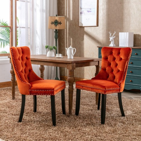 Velvet tufted store dining chairs