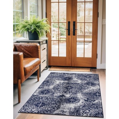 Indigo and Ivory Synthetic Low Pile Bohemian Area Rug