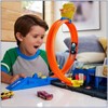 Hot Wheels Toy Car Track Set, Super Police Station Playset with 1:64 Scale Die-Cast Vehicle, Adjustable Loop for Multiple Ways to Race & Stunt - 2 of 4