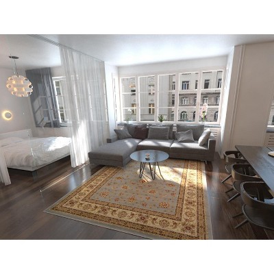 Light Blue and Cream Synthetic 9' x 12' Traditional Area Rug