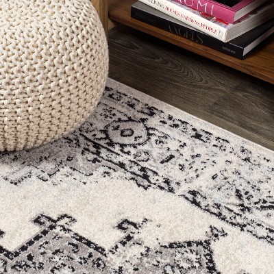 4' x 6' Dark Gray and Cream Medallion Synthetic Area Rug
