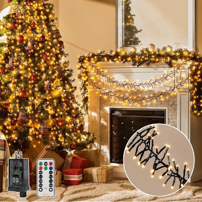 Ollny 1000 LED Warm White Christmas Cluster Lights (Green Cable, Plug in, 8 Modes, IP44 Waterproof)