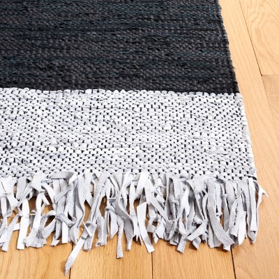 Handmade Light Grey and Black Cowhide Area Rug with Fringe