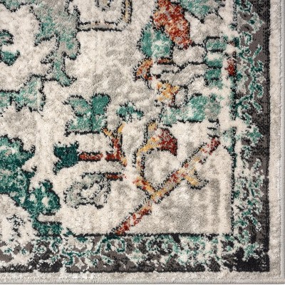 Green Floral Distressed 6' x 9' Synthetic Area Rug