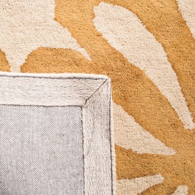 Handmade Tufted Blue Floral Wool 4' x 6' Rug