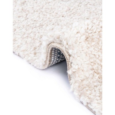 Ivory Rectangular 5' x 7' Solid Shag Synthetic Rug