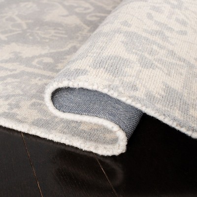 Handmade Light Grey and Ivory Wool Tufted Area Rug