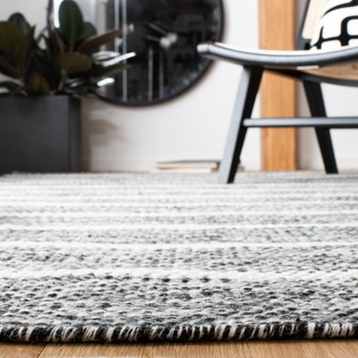 Handmade Black and Ivory Wool Striped Area Rug