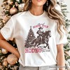 Annual North Pole Rodeo T-Shirt, Funny Cowboy Santa Christmas Tee for Country Lovers| OrnamentallyYou - 4 of 4