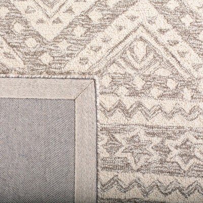 Hand-tufted Elegance Round Gray Wool 59" Area Rug