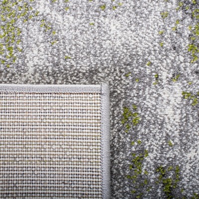Galaxy 8' x 10' Grey and Green Abstract Area Rug