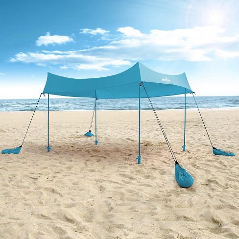 Wind resistant beach clearance canopy