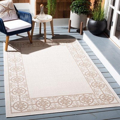 Ivory and Beige Geometric Synthetic Indoor/Outdoor Area Rug