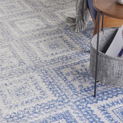 Ivory Geometric Synthetic Easy Care 6' x 9' Area Rug