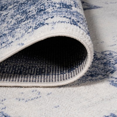 Light Blue/Ivory Reversible Synthetic Area Rug 4' x 6'