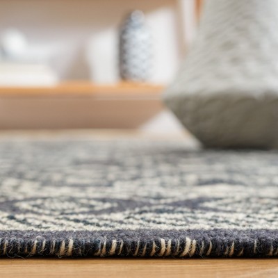 Handmade Black and Ivory Wool Flat Weave Area Rug, 4' x 6'