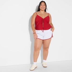 Women's Game Day Flyaway Woven Tank Top - Wild Fable™ - 1 of 3