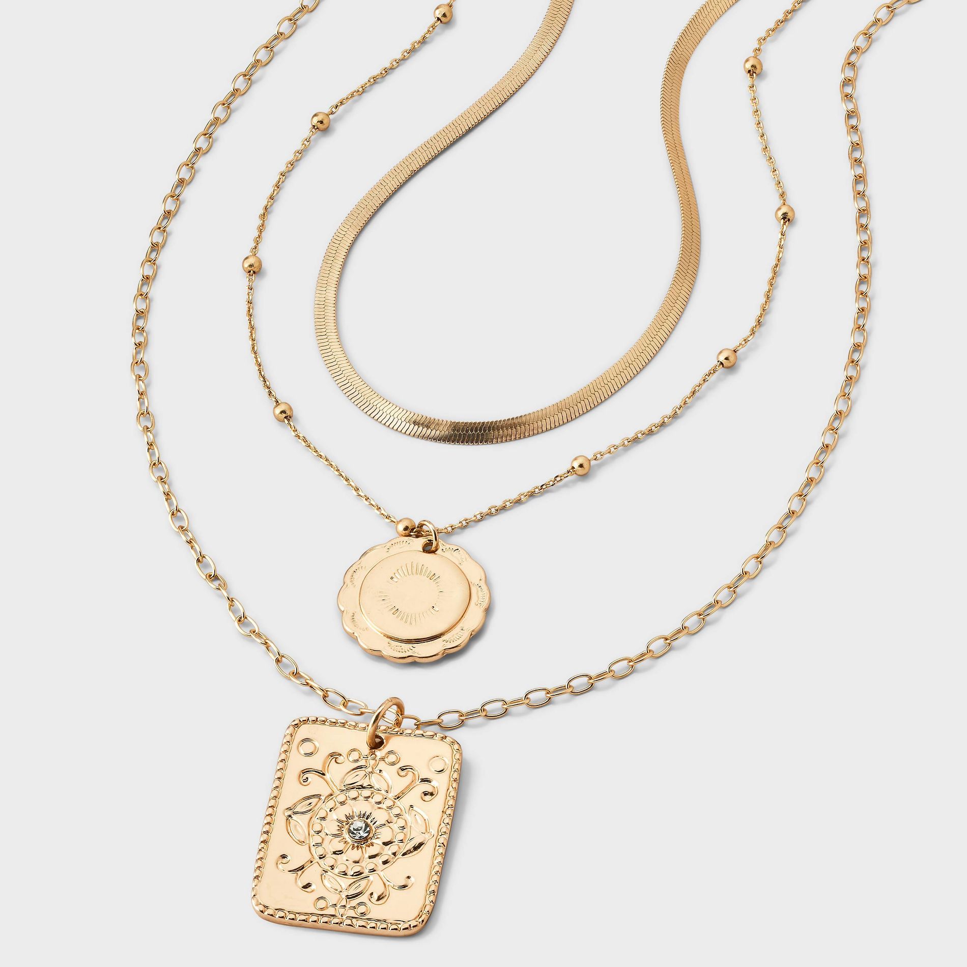 Layered Necklace with Western Stamped Charms - Universal Thread™ Gold