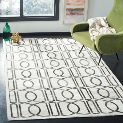 Handmade Ivory Geometric Cowhide Area Rug 47" x 5"