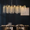 BAOURE 23.6-inch Modern Golden Pendant Light with Cascading Crystal Strands, Ideal for Living Room, Dining Room and Foyer - 2 of 4