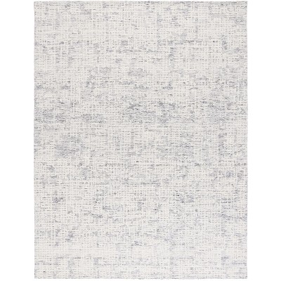 Ebony EBN216 Handmade Tufted Rug - Safavieh