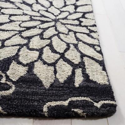 Handmade Black and Ivory Floral Wool Area Rug 3' x 5'