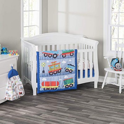 Everyday Kids 4-Piece Crib Bedding Set – Choo Choo Train Theme with Quilt, Sheet, Dust Ruffle & Diaper Stacker – Baby Boy Nursery Décor