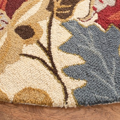 Handmade Blue Floral Wool Round Tufted Area Rug