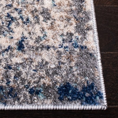4' x 6' Gray and Navy Abstract Synthetic Area Rug
