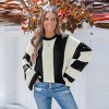 Women's Chic Black & White Round Neck Striped Bell Sleeve Knit Sweater - Cupshe - 2 of 4