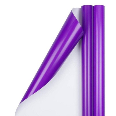 Skating penguin glossy purple wrapping paper