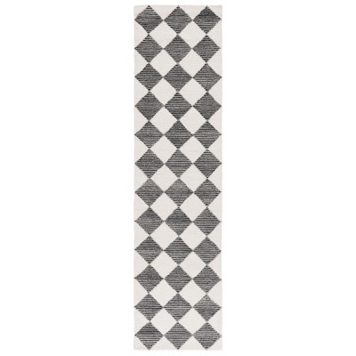 Ebony EBN120 Handmade Tufted Rug - Safavieh
