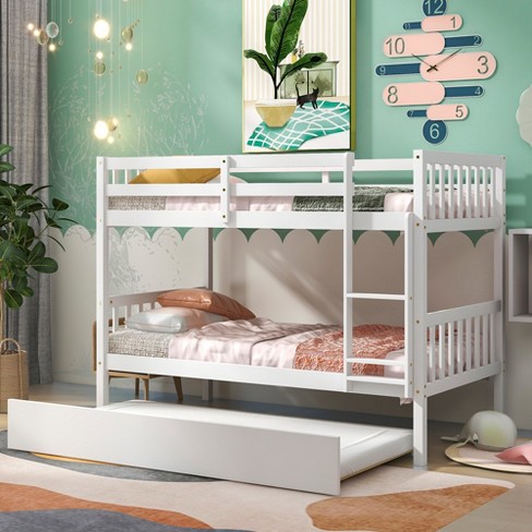 White twin bunk bed with outlet trundle