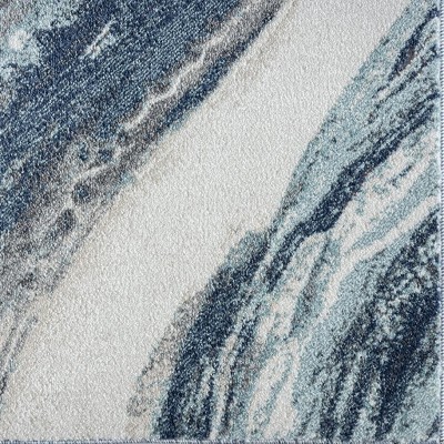 Blue and White Abstract 8' x 10' Synthetic Area Rug