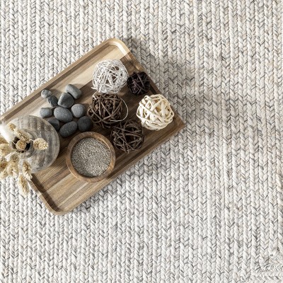 Handmade Ivory Braided 4' x 6' Oval Synthetic Area Rug