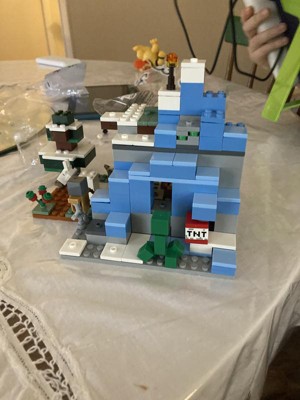 LEGO Minecraft The Frozen Peaks 21243, juego de montaña cueva con Steve,  Creeper, figuras de cabra y accesorios, juguete de bioma ICY para niños de  8